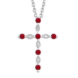 DIAMOND AND RUBY CROSS PENDANT