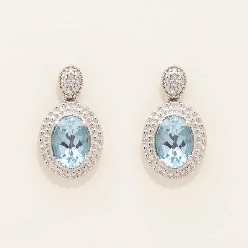 Oval Blue Topaz Drop Earrings in Sterling Silver with Diamonds (1/20ct tw)