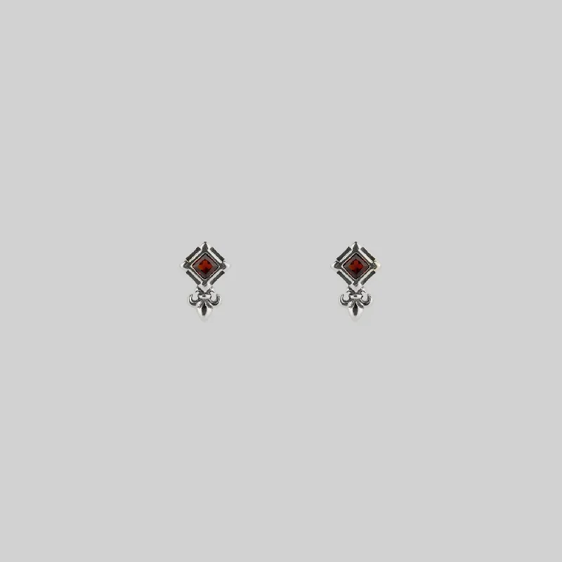 SCORN. Tiny Garnet Stud Earrings - Silver